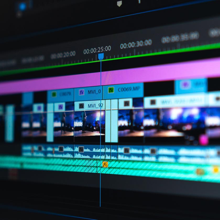 Computer monitor showing Adobe Premiere Pro editing software in use.