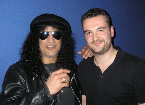 Me standing next to a smiling Slash from Guns N Roses
